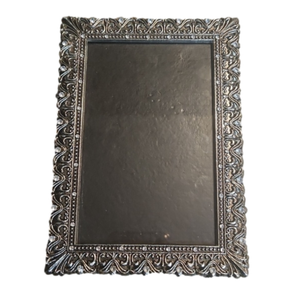 Other - Cast metal with the quality of pewter color finish and bling